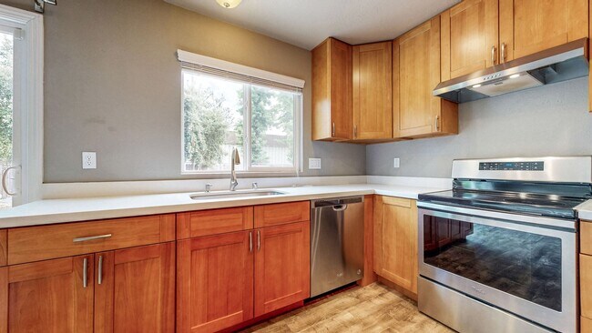 Building Photo - Bright 2 Bedroom, 1 Bathroom Single Family Home! Attached 2 Car Garage and Landscaping Included!