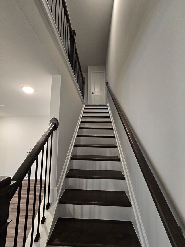 Building Photo - NEWLY BUILT END UNIT TOWNHOME