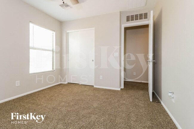 Building Photo - 10946 W College Dr