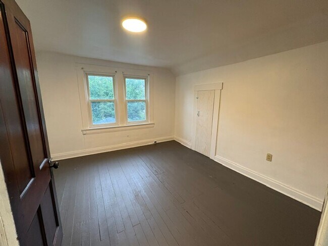 Building Photo - Updated West Akron Home with Flexible Living Space, Large Yard & Garage