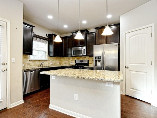 Building Photo - 7709 Menchaca Rd