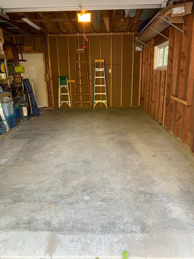 One-car attached garage with opener - 317 N Wasson Ln