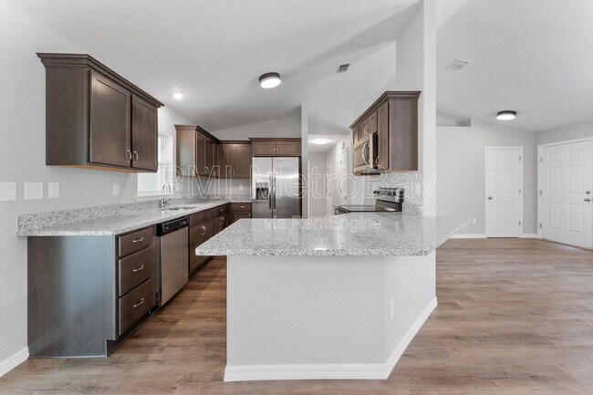 Building Photo - 9461 N Sandree Dr