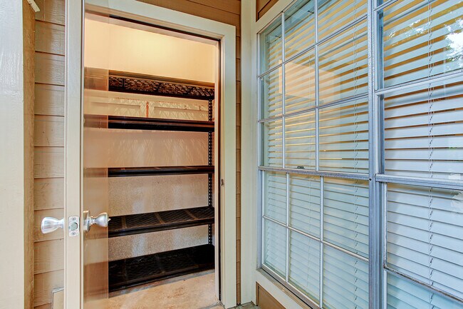 Roomy outdoor storage closet with shelves. - 1880 White Oak Dr. Apt 119