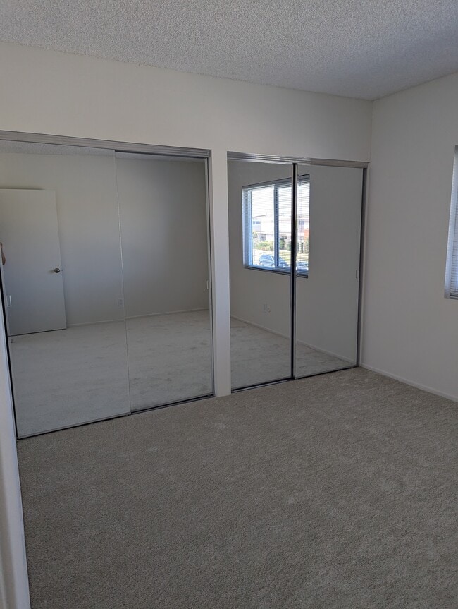 Front bedroom mirror closets - 2960 W 235th St