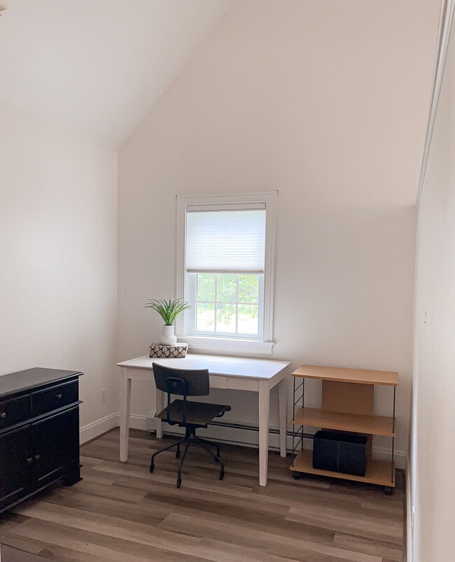 Office space separated by 3/4 pony walls - 21 Willowbrook Ave