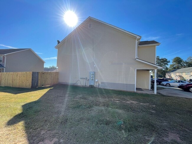Building Photo - Spacious 4 Bedroom Townhome in Jackson with fenced backyard!