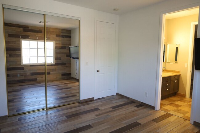 Building Photo - Fully Upgraded 5 Bedroom 4.5 Bathroom in Guard Gated Foothills Community!