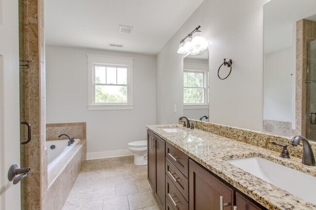 Building Photo - Stunning 4 Bedroom / Amazing Location / Fenced in Backyard / Beautiful Covered Front Porch