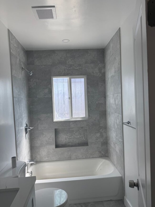 Building Photo - FOR RENT — COMPLETELY REMODELED Apartment