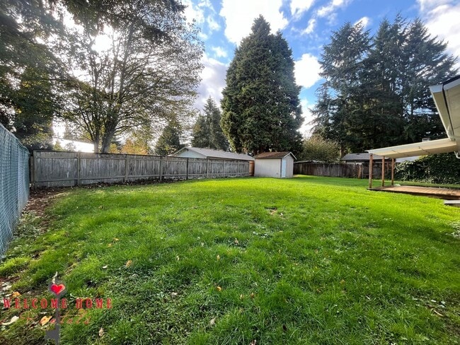 Building Photo - Beautiful Remodeled Rambler!!!  Come enjoy this HUGE backyard!!  NEW CARPET!!