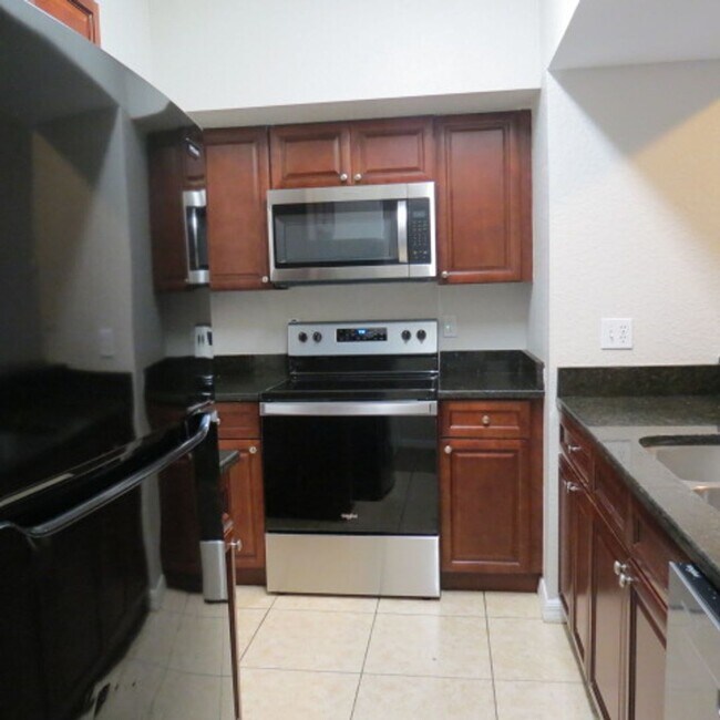 Building Photo - Millenia Mall area! Location! Manned Gated...