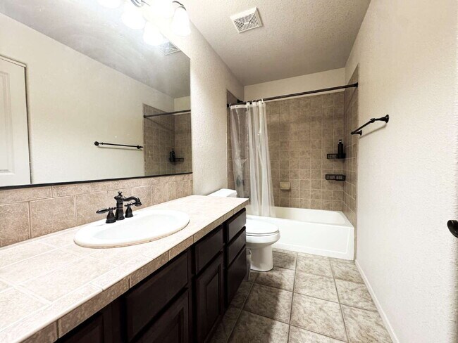 Building Photo - "Spacious 4-Bedroom, 2-Bathroom SOLAR Home in Mesa del Sol!"