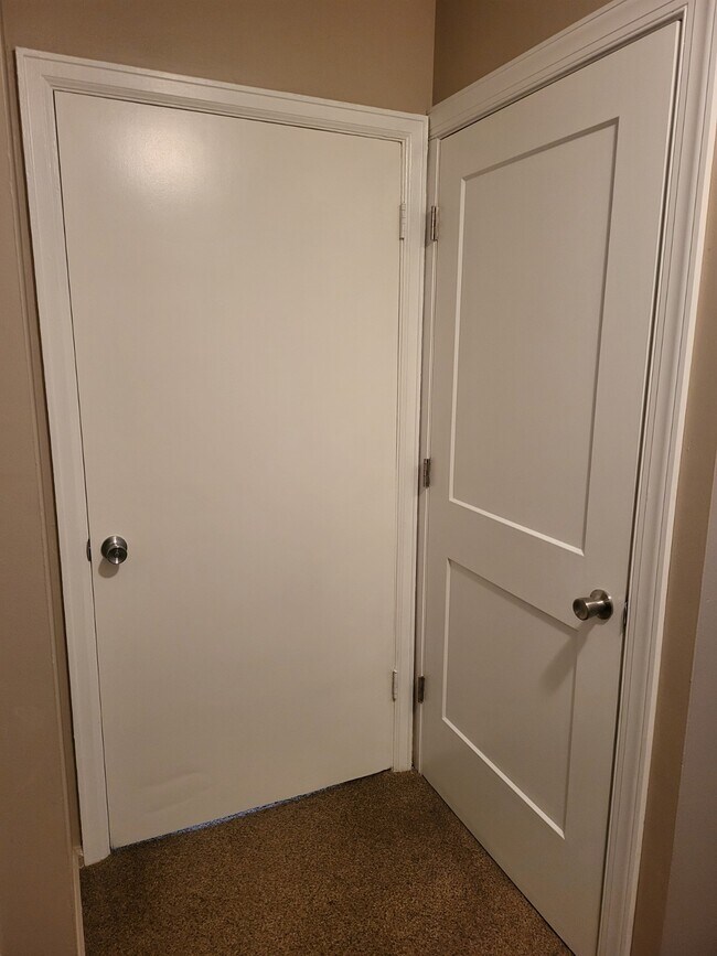 Door to main bath/linen closet - 1777 Parkway Dr S