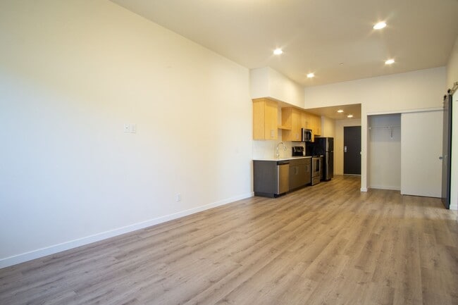 Building Photo - SUMMER SPECIAL: Top Floor Modern 2 Bdr w/ W&D + AC!