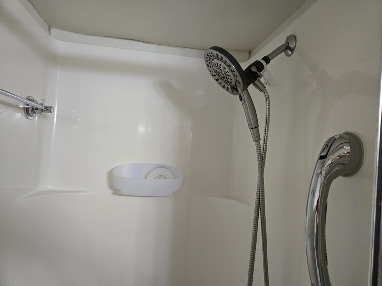 New shower head and bar - 3339 Sanford Dr