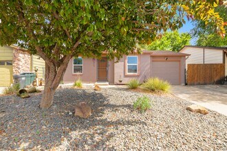 Building Photo - Updated 4-Bedroom Home with Central A/C & Xeriscaped Yard