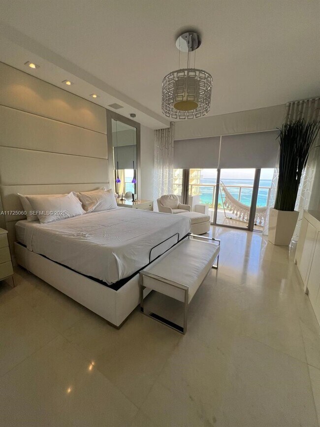 Building Photo - 9701 Collins Ave