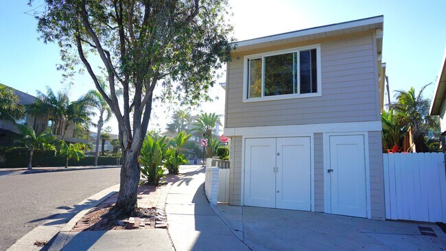 Building Photo - THE BEACH IS YOUR BACKYARD! Light & Bright...
