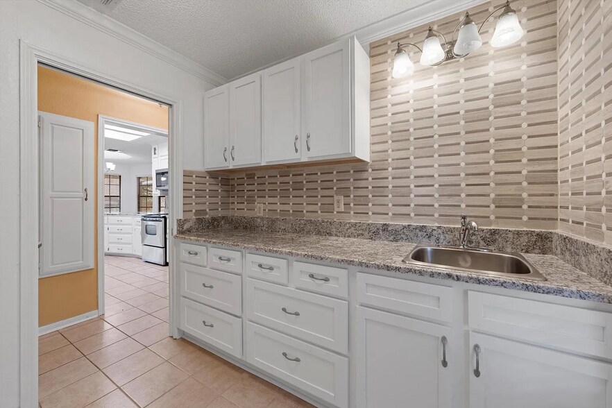 Laundry Room Storage Built-in Ironing Board - 273 Leafy Hollow Ln