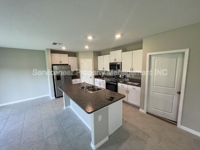 Building Photo - 12032 MIracle Mile Dr