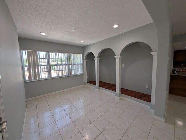 Building Photo - 6947 Bottle Brush Dr