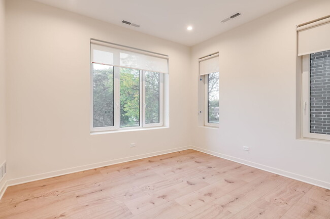 Building Photo - 8029 W Belmont Ave