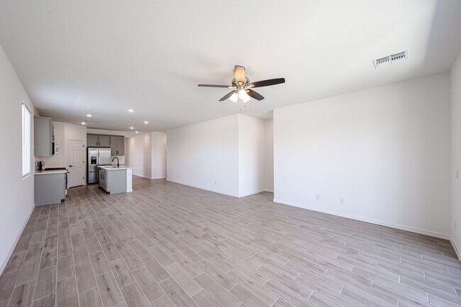 Building Photo - Modern Mountainside Living: Stunning New 4-Bedroom Home in Estrella Crossing! 3 CAR GARAGE!
