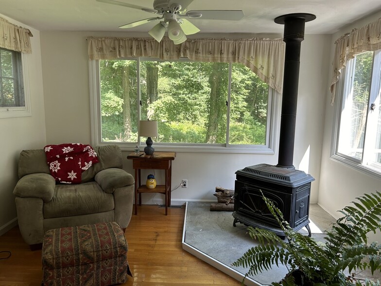 sitting or dining area off the kitchen. Working wood-burning stove - 89 Florida Hill Rd