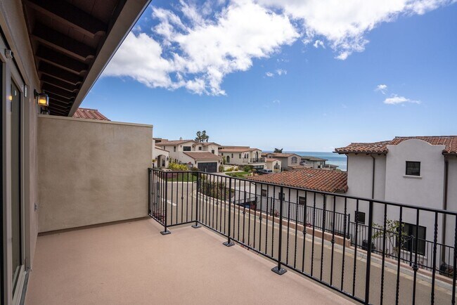 Building Photo - This Sunset Beach Estates Townhome will ha...