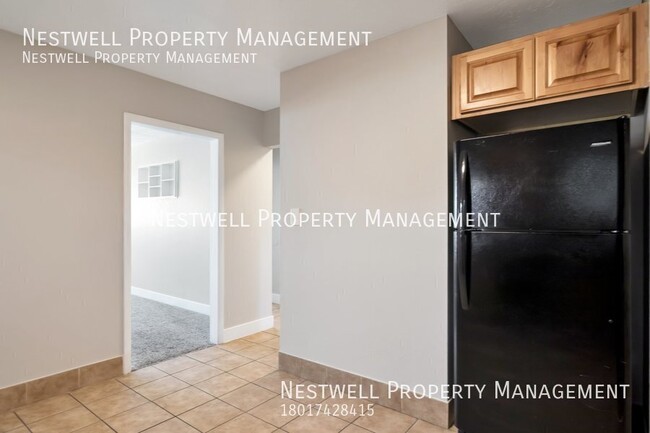 Building Photo - FREE 1ST MONTH'S RENT - Remodeled 2-bed Un...