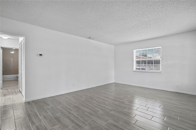 Building Photo - 3100 Coral Springs Dr