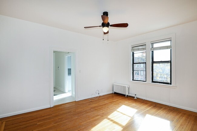 Building Photo - 11525 Metropolitan Avenue, 233