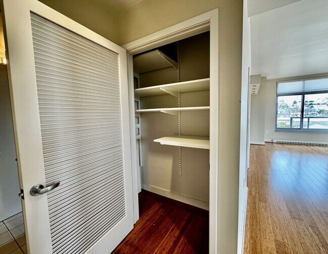 Building Photo - Corner Light. City Energy. Zero Compromise.