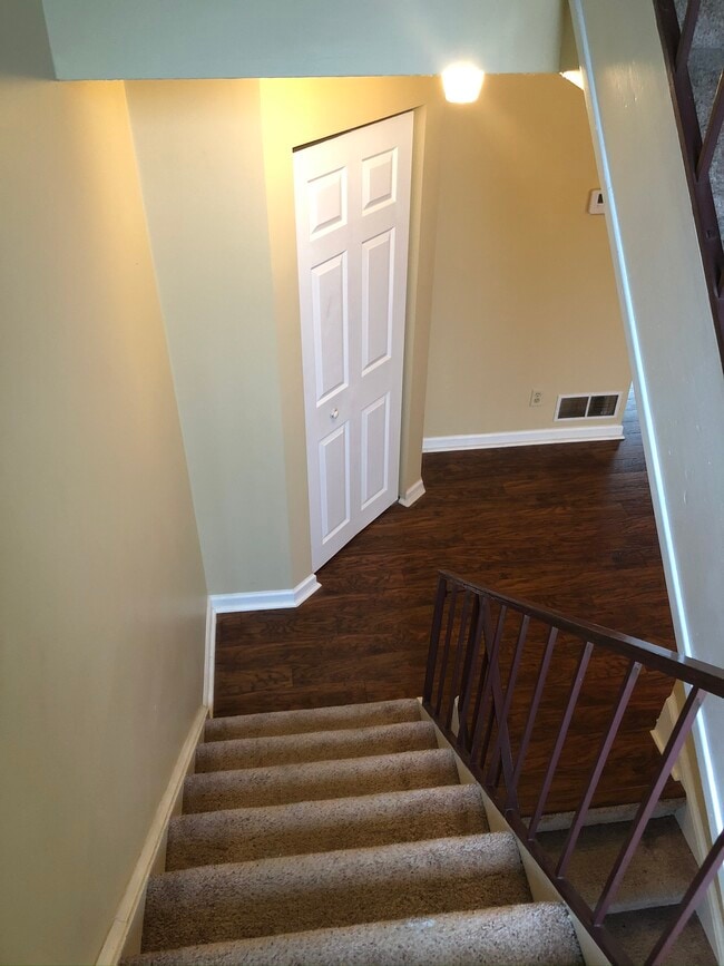 Staircase to first floor - 3199 Camberly Dr