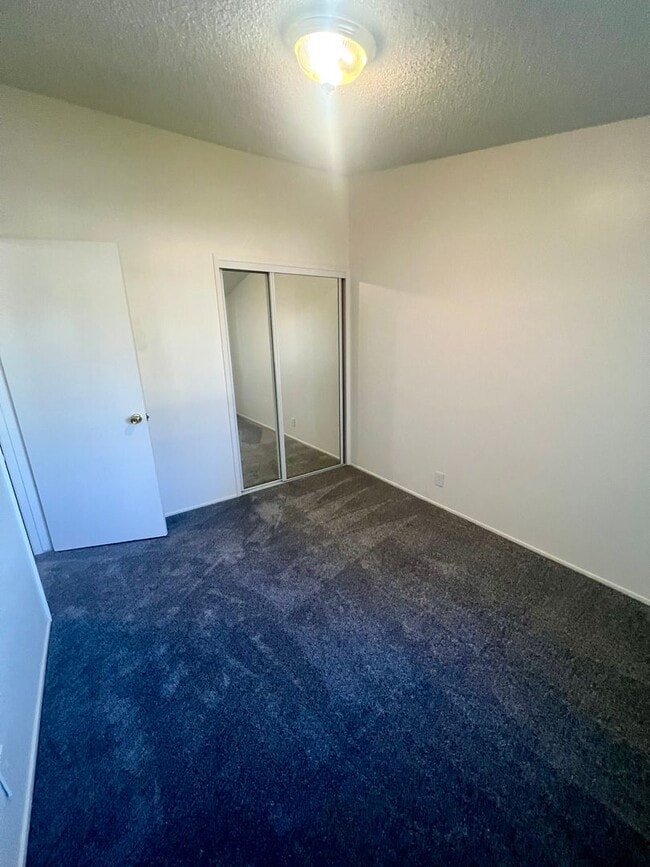 Building Photo - Spacious Two Bedroom with New Carpet - Available Now!