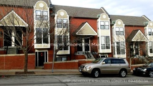 Primary Photo - 520 W 10th St - Stunning townhome with gra...