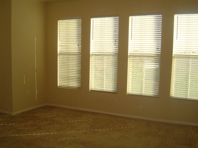 Building Photo - Move-In Ready Condo with Private Balcony & Modern Upgrades