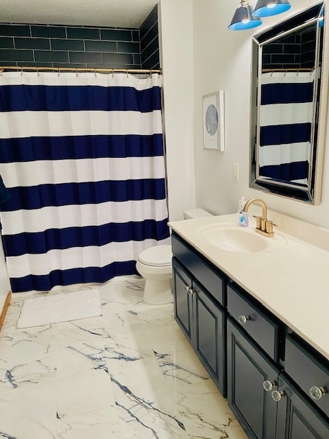 Shared bathroom with double vanity. - 18679 Pathfinder Dr