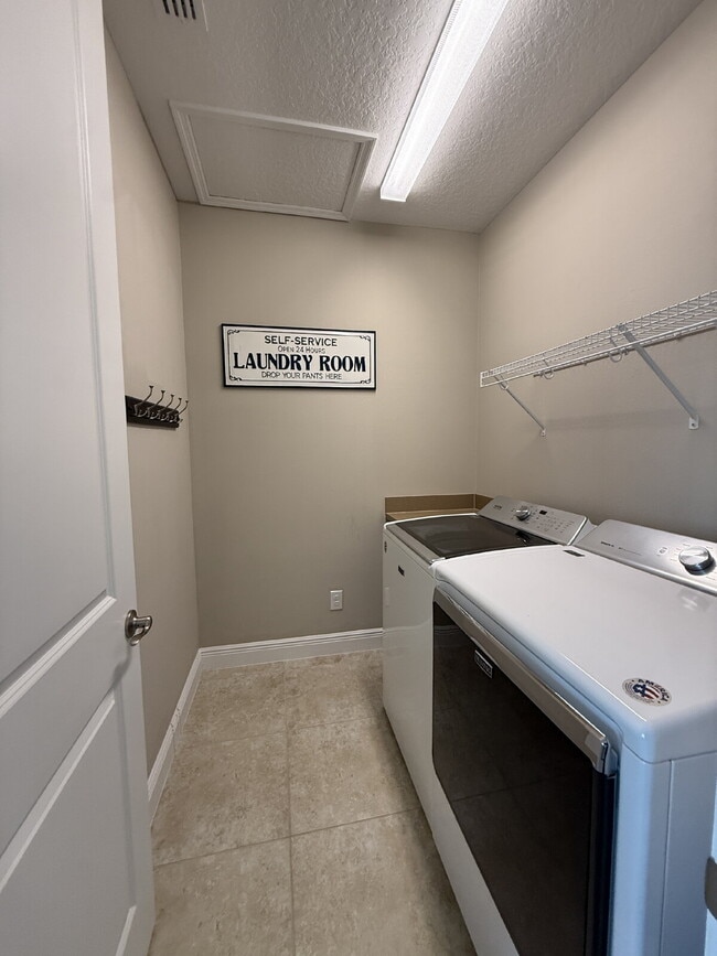 Building Photo - 4BR, 2.5BA home with resort style outdoor living!