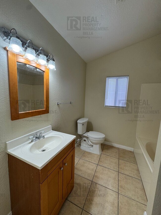 Building Photo - Corner-Lot Charmer with Open Layout and Sp...