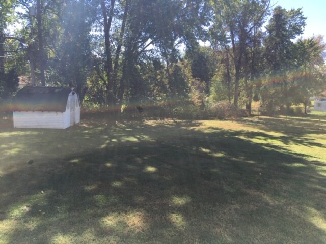 fenced in back yard with large storage shed - 2037 Terrace Drive