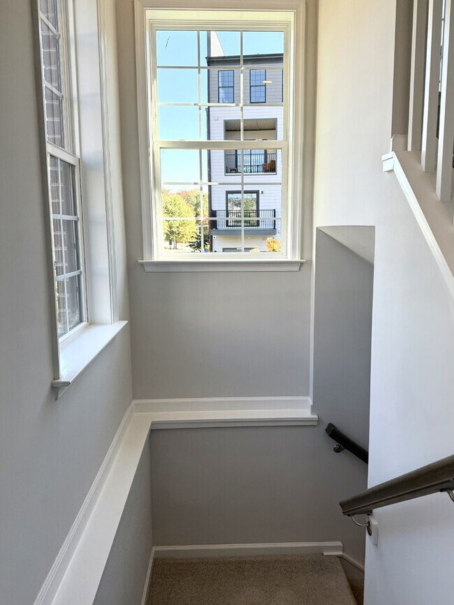 Building Photo - Be the First to Live Here! Brand-New 3BR Condo in Coalfield Station – Modern Living in the Heart ...