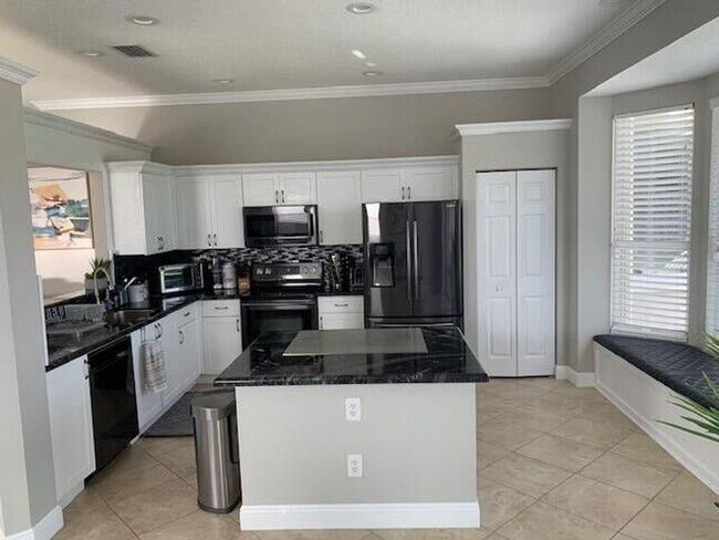 Building Photo - 7891 Manor Forest Blvd