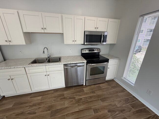 Building Photo - April Villas Triplex