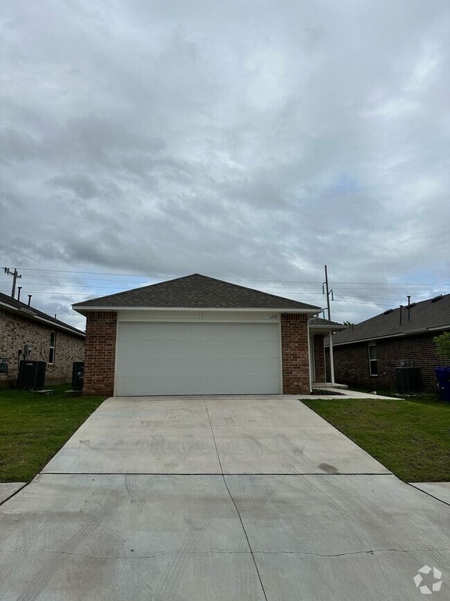Building Photo - First Month Free! Nearly new home - built ...