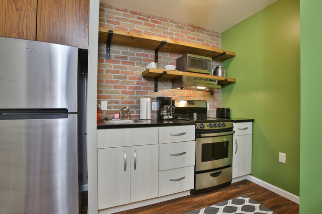 Building Photo - Fully Furnished Suites Available!