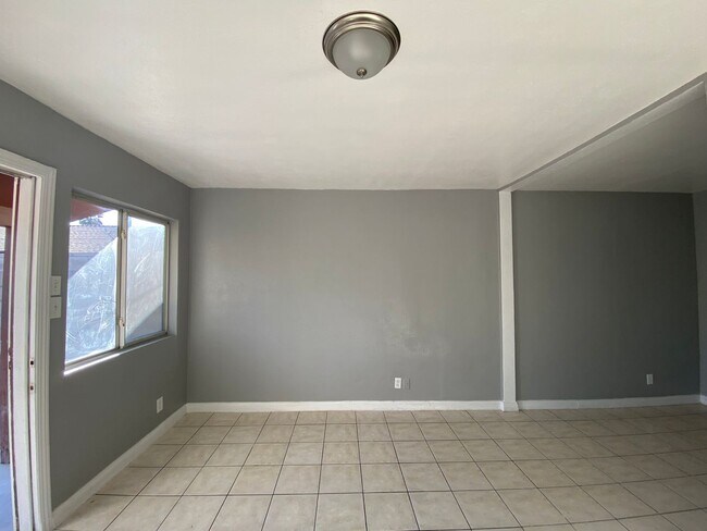 Building Photo - Hard to Find 1 BD 1 BA House with a 2 car garage and it's own yard.