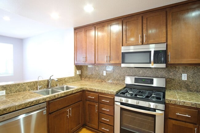 Building Photo - NOW AVAILABLE- NEW PRICE! Spacious 3-Bed, ...