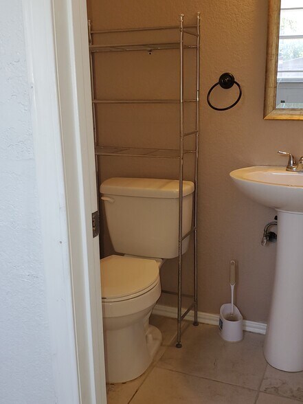 Downstairs half bathroom - 9140 Timber Path